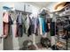 Spacious walk-in closet with ample storage, including shelves, rods, and compartments at 63 Brookstone E Park, Acworth, GA 30101