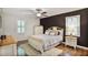 Bedroom featuring a neutral color scheme, plantation shutters, and hardwood floors at 1491 Kolb Ridge Sw Dr, Marietta, GA 30008