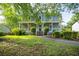 Charming two-story home featuring a welcoming front porch and well-manicured landscaping at 1491 Kolb Ridge Sw Dr, Marietta, GA 30008