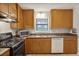 Kitchen with stainless steel appliances, granite countertops, and ample cabinet space at 1491 Kolb Ridge Sw Dr, Marietta, GA 30008