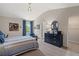 Comfortable bedroom with blue accents, a large dresser, and a serene atmosphere at 211 Linford Dr, Locust Grove, GA 30248