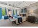 A stylish bedroom boasts tray ceiling and soft carpet at 211 Linford Dr, Locust Grove, GA 30248