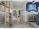 Elegant foyer with hardwood floors, staircase with iron spindles, and stylish decor leading to the living spaces at 211 Linford Dr, Locust Grove, GA 30248