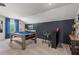 Entertaining game room featuring a pool table, bar area, and stylish decor at 211 Linford Dr, Locust Grove, GA 30248