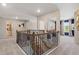 Upstairs hallway with an open view to other rooms with carpet floors and natural lighting at 211 Linford Dr, Locust Grove, GA 30248