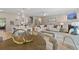 Open-concept living space integrating kitchen, dining, and living areas, ideal for entertaining and Gathering gatherings at 211 Linford Dr, Locust Grove, GA 30248