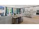 Open-concept design connects the living, dining, and kitchen areas, creating an inviting and functional living space at 211 Linford Dr, Locust Grove, GA 30248