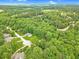 Overhead view of the neighborhood showing tree-lined streets and lush green landscape at 2333 Orion Ct, Grayson, GA 30017