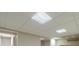Finished basement ceiling featuring modern lighting and tiled panels for a clean look at 2333 Orion Ct, Grayson, GA 30017
