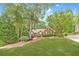 Classic brick home with a well-kept lawn and attractive landscaping enhancing curb appeal at 2333 Orion Ct, Grayson, GA 30017