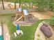 Backyard playground area featuring a playset, slide, swings, and picnic area for Gathering fun at 2333 Orion Ct, Grayson, GA 30017