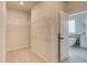 Spacious walk-in closet with ample shelving and carpeted flooring at 234 Linford Dr, Locust Grove, GA 30248