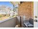 Private balcony with a seating area and view of the surrounding community at 3268 Clairmont Ne, Brookhaven, GA 30329