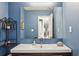 Bathroom with a large mirror at 3268 Clairmont Ne, Brookhaven, GA 30329