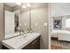 Bathroom with modern fixtures and a glimpse into the well-decorated bedroom at 3268 Clairmont Ne, Brookhaven, GA 30329