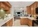 Bright kitchen adjoining a cozy living room with a fireplace at 3268 Clairmont Ne, Brookhaven, GA 30329