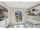 Laundry room featuring storage, bright light and shelving, making chores a breeze at 3268 Clairmont Ne, Brookhaven, GA 30329