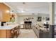 Inviting living area featuring hardwood floors, a convenient workspace, and open access to the kitchen at 3268 Clairmont Ne, Brookhaven, GA 30329