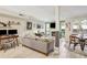 Bright living room boasts neutral tones, a cozy fireplace, and tiled flooring throughout at 3268 Clairmont Ne, Brookhaven, GA 30329
