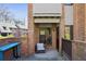 Private brick patio with a cozy seating area and easy access to the outdoors at 3268 Clairmont Ne, Brookhaven, GA 30329