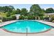 Enjoy the community pool surrounded by lush greenery for a refreshing escape at 3268 Clairmont Ne, Brookhaven, GA 30329