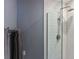 Modern shower with white subway tiles and a sleek glass door at 3268 Clairmont Ne, Brookhaven, GA 30329