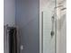 Modern shower with a glass enclosure, white subway tiles, and a rainfall shower head at 3268 Clairmont Ne, Brookhaven, GA 30329