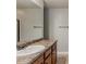 Bathroom featuring a vanity with marble top, and a large mirror at 5567 Union Pointe Pl, Union City, GA 30291