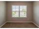 Bedroom showcasing a window with blinds, offering natural light at 5567 Union Pointe Pl, Union City, GA 30291
