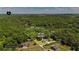 Aerial view of 4.19 acre lot with property lines, beautiful home, and lush green surrounding landscape at 104 Meadow View Trl, Canton, GA 30115