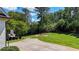 Expansive backyard featuring a fire pit and seating area, enclosed by a classic wooden fence at 104 Meadow View Trl, Canton, GA 30115