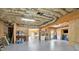 Spacious unfinished basement with exposed insulation and natural light from windows at 104 Meadow View Trl, Canton, GA 30115