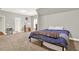 Bedroom features gray walls and carpet, a small desk, and lots of natural light at 104 Meadow View Trl, Canton, GA 30115
