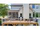 View of the outdoor deck with a screened-in porch and outdoor kitchen area at 104 Meadow View Trl, Canton, GA 30115
