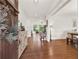 Inviting foyer with gleaming hardwood floors, elegant furnishings, and an open view into the living space at 104 Meadow View Trl, Canton, GA 30115