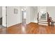 Hallway showcases hardwood floors leading to bedrooms and play areas at 104 Meadow View Trl, Canton, GA 30115