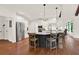 Bright kitchen with stainless steel appliances, a center island with seating and wooden floors at 104 Meadow View Trl, Canton, GA 30115