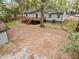 Backyard with deck, detached garage, mature trees and ample open space at 2205 Stockbridge Se Dr, Atlanta, GA 30316