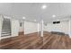 Finished basement area with laminate floors and recessed lighting at 2205 Stockbridge Se Dr, Atlanta, GA 30316
