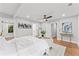 A bright bedroom with hardwood floors, neutral paint, and access to bath at 2205 Stockbridge Se Dr, Atlanta, GA 30316