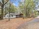 Charming home with a well-manicured lawn, a welcoming front porch and beautiful landscaping at 2205 Stockbridge Se Dr, Atlanta, GA 30316