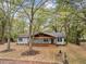 Charming home with a welcoming front porch, and beautiful landscaping at 2205 Stockbridge Se Dr, Atlanta, GA 30316