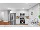 Modern kitchen with stainless steel appliances, white cabinets, granite countertops, and a gas range at 2205 Stockbridge Se Dr, Atlanta, GA 30316