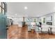 Bright and airy living room with hardwood floors, an open layout, and modern decor and stainless steel appliances at 2205 Stockbridge Se Dr, Atlanta, GA 30316