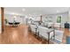 Open-concept living and dining space with hardwood floors, stylish furnishings, and lots of natural light at 2205 Stockbridge Se Dr, Atlanta, GA 30316