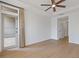 Bright bedroom with a private balcony, ceiling fan, and neutral color palette at 3334 Peachtree Ne Rd # 101, Atlanta, GA 30326