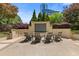 Inviting outdoor seating area with comfortable chairs and lush greenery for relaxing and socializing at 3334 Peachtree Ne Rd # 101, Atlanta, GA 30326