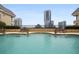 A serene swimming pool offers a refreshing escape with lounge seating available for relaxing poolside at 3334 Peachtree Ne Rd # 101, Atlanta, GA 30326