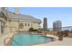 Luxury rooftop pool area with lounge chairs and city views; great for relaxing and entertaining guests at 3334 Peachtree Ne Rd # 101, Atlanta, GA 30326