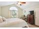 Bright bedroom with natural light, a comfortable bed, and ample space for relaxation at 401 Kenley Ct, Mcdonough, GA 30253